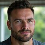 Portrait of Marcus Thorne, a confident man with a thoughtful expression and athletic build, wearing business casual attire.